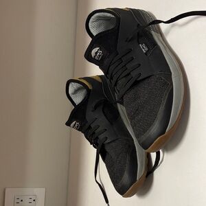 Stylish Black and Gray Sneakers with Tan Details